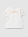 Blusa seersucker com detalhe de smocks