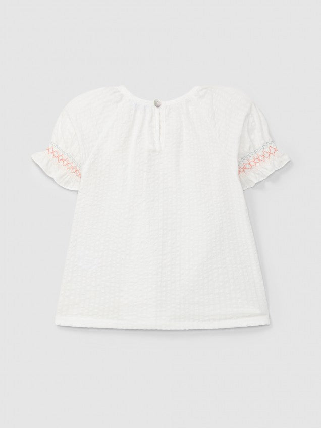 Blusa seersucker com detalhe de smocks